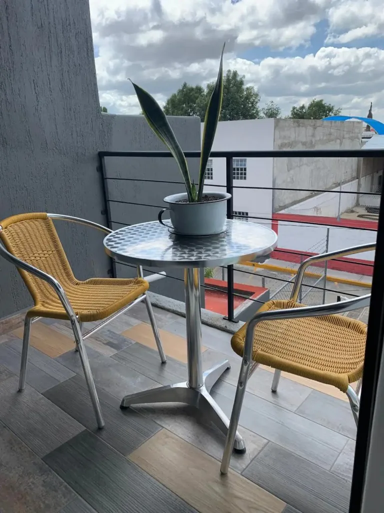 Suite Terraza Suites 509 en Pachuca con terraza privada amueblada para hospedaje boutique